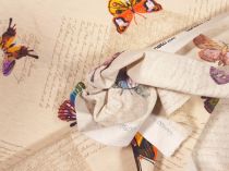 Textillux.sk - produkt Dekoračná látka motýle na popísanom podklade 140 cm