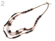 Kovový náhrdelník s filigránovými korálikmi